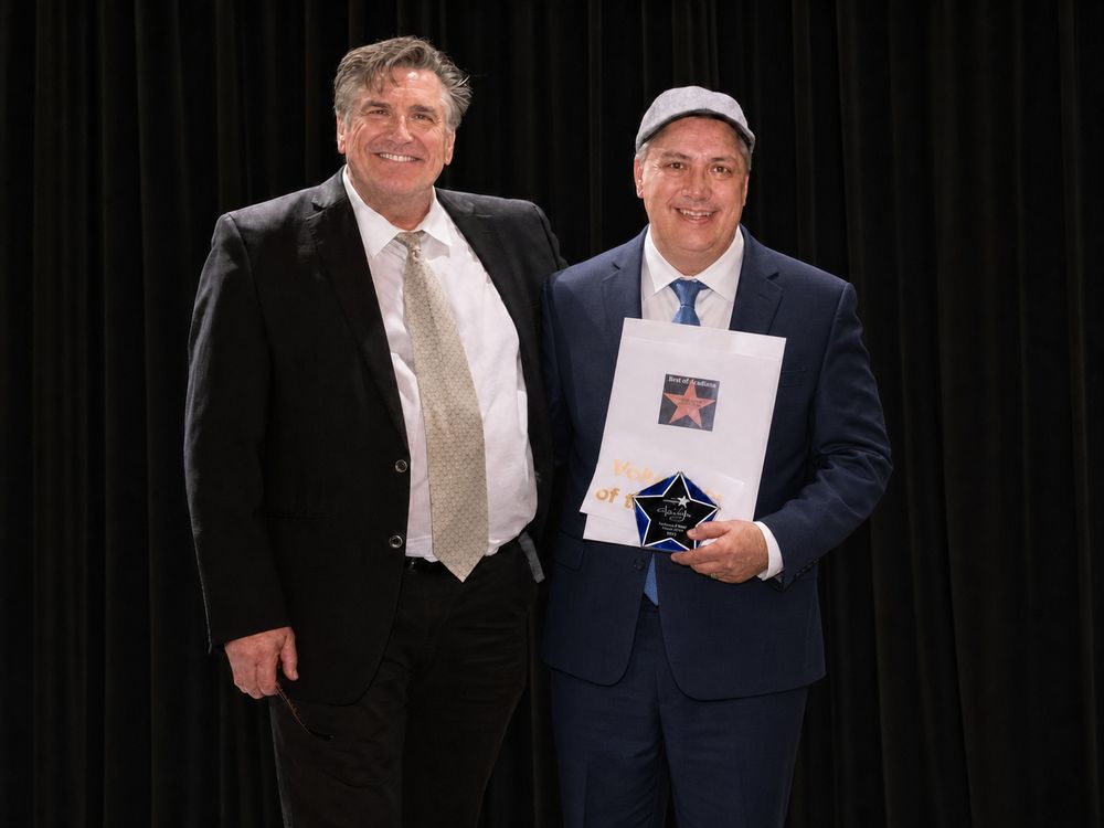 Northeast Chamber of Commerce President Jack Bradshaw with Magik Digital's Bob Dubeansky receiving the 2026 Volunteer of the Year Award